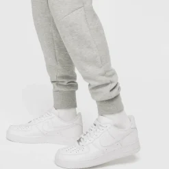 Tech Fleece joggingbroek heren dark grey heather black*Nike